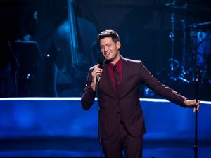 Supporting image for story: Michael Buble fends off Machine Gun Kelly to deliver chart success