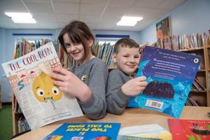 Pupils at Longlands Primary School received a number of new books from David Wilson Homes. Photos: Steve Baker