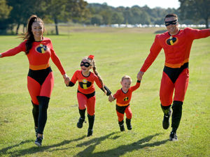Supporting image for story: Hundreds dress as superheroes in St Giles Hospice walk in Walsall
