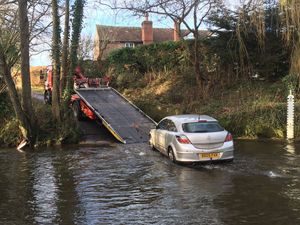 Supporting image for story: Car stranded in Shropshire ford is finally winched to dry land
