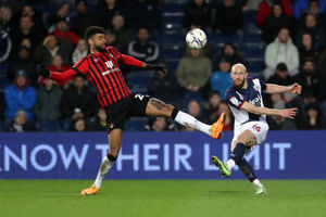 Philip Billing of AFC Bournemouth and Matt Clarke of West Bromwich Albion during the Sky Bet Championship match between West Bromwich Albion and AFC Bournemouth at The Hawthorns on April 6, 2022 in West Bromwich, England. (Photo by Adam Fradgley/West Bromwich Albion FC via Getty Images).