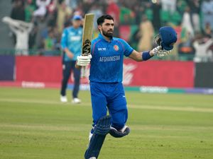 Afghanistan’s Ibrahim Zadran celebrates after scoring century