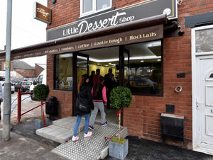 The first few customers arrive