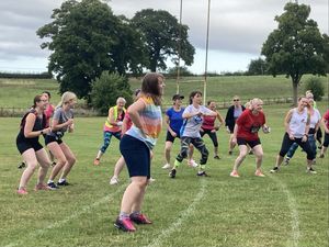 Supporting image for story: Runners raise £900 for hospice 