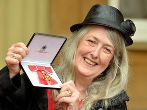 Receiving her OBE in 2013