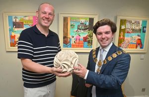 Shrewsbury Mayor Alex Wagner meeting traders along Wyle Cop to celebrate Independents' Day. With Jonathan Soden from Sodens Art Gallery