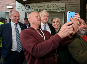 Former PM Boris Johnson posing for a selfie with customer Mark Nicholls at The Park Inn