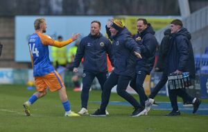Michael Appleton celebrates with Taylor Perry
