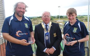 Home award winners - Callum Wraight and Liam Stevens (Shropshire player of the match) flank County President Simon Fullard