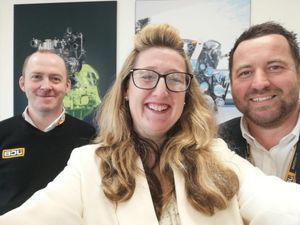 Sheila is pictured with JCB's Managing Director Robert Taylor and HSE & Facilities Manager Steven Mullen.jpg