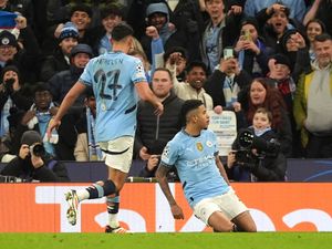 Supporting image for story: Manchester City survive a shock to keep their Champions League campaign alive