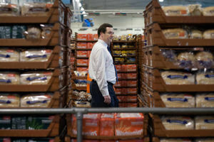 George Osborne walks through the huge bakery