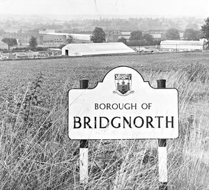 The caption accompanying this photograph from September 1961 reads: 'One usually thinks of Bridgnorth as a market town, but when entered from the Stourbridge side (as seen here) there is a rather new look in the form of factories now being built...' 