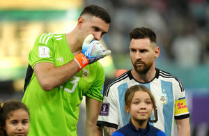 Argentina goalkeeper Emiliano Martinez (left) and Lionel Messi