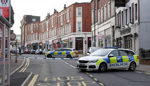 Police at the scene of the stabbing on Friday morning