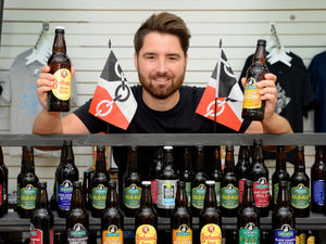 Supporting image for story: 'Stay sairf, sairve lives': Black Country shop reopens with themed face masks and beer after bostin' sign goes viral