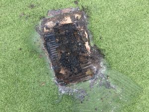 Supporting image for story: Thoughtless: Bank holiday barbecue melts astroturf cricket pitch at Telford park