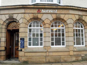 Supporting image for story: NatWest stands firm over hours cut