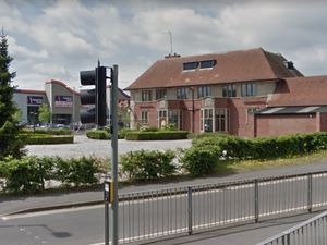 Supporting image for story: Car dealership facing enforcement action after gravelling green space to display vehicles