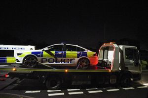 A police car is taken away from the scene. Photo SnapperSK.