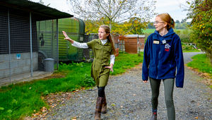 Jamie walking outside to see Cuan Wildife Rescue's outdoor area with Becky Lewis, Assistant Hospital Manager. Image by Eagle Eyed Girl
