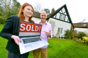 Current owner Mike Chatha and Elizabeth Williams from Clarkes Solicitors outside the farmhouse