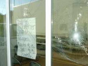 Supporting image for story: Vandals hit barber shop again