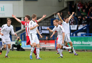 Mike Grogan of AFC Telford United celebrates after scoring a goal to make it 1-0