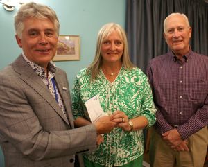 Caption: Newly inducted Shrewsbury Severn Rotarian Joycelin Hoyland flanked by president Johnathan Callwood and secretary Gareth Watkins.
