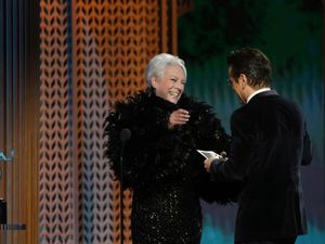 Supporting image for story: Jamie Lee Curtis presents SAG prize to Colin Farrell, saying he gave her Covid