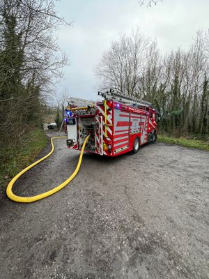 The crews used hoses to deal with the fire. Picture: Amber Watch Wellington.