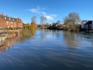 Pathways are already flooded along the River Severn, viewed here from Greyfriars Bridge in Shrewsbury