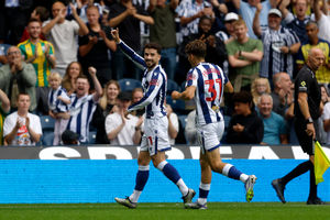 Tom Fellows celebrates with Mikey Johnston during the former's final game for Albion last month. (Photo by Adam Fradgley/West Bromwich Albion FC via Getty Images)