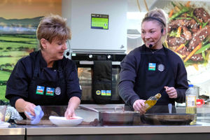 Chef Elwen Roberts and Olympian and World Champion boxer Lauren Price cook up a storm on a Hybu Cig Cymru stand