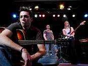 Supporting image for story: Aynsley Lister painting the town blue