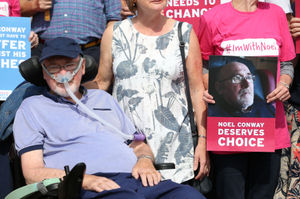 Terminally-ill Noel Conway, 67, arriving at Telford County Court with supporters to view a video link of a judicial review on assisted dying. 
