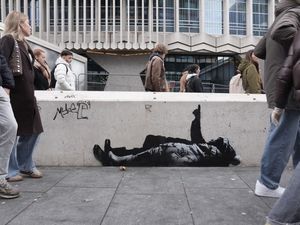 Supporting image for story: Artwork thought to be by Banksy appears at foot of London skyscraper