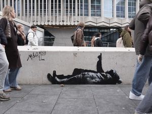 Supporting image for story: Artwork thought to be by Banksy appears at foot of London skyscraper