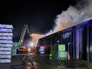 Supporting image for story: Crews spend all night battling blaze at construction company HQ