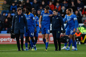 Shrewsbury Town's Tom Flanagan comes off injured in the first period (AMA)