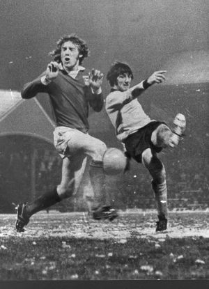 November 1972 - Ipswich defender Kevin Beattie takes avoiding action as Wolves' John Richards takes a shot at goal.