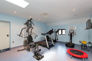 A gym at Stoke Park. The property has been listed for £3 million. Picture: Rightmove/Savills.