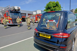 Firefighters at Walsall Fire Station turned out in full kit to honour a 100-year-old former firefighter and war hero George Stokes.
