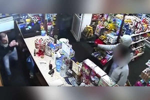 CCTV captures the moment the gunman points the weapon at Shikha