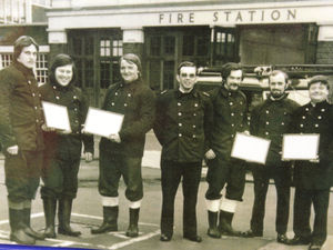 An old photograph of Vernon, who is pictured in the centre