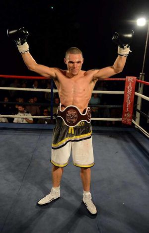 And the new - Grant Cunningham is handed the belt after a points victory by four rounds over Kieron Gray.