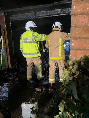 Firefighters assessing the damage. Picture: Amber Watch Wellington
