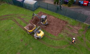 A bird’s eye view of the Bovis Homes and Linden Homes site team from The Quarters @ Redhill location, in Telford, in the process of building a new sandpit at Holmer Lake Primary School.