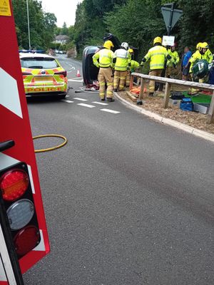 A motorist was taken to hospital after a car flipped onto its side. Pic: Market Drayton Fire Station