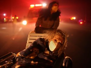 Supporting image for story: Thousands flee as wildfires burn out of control in Los Angeles